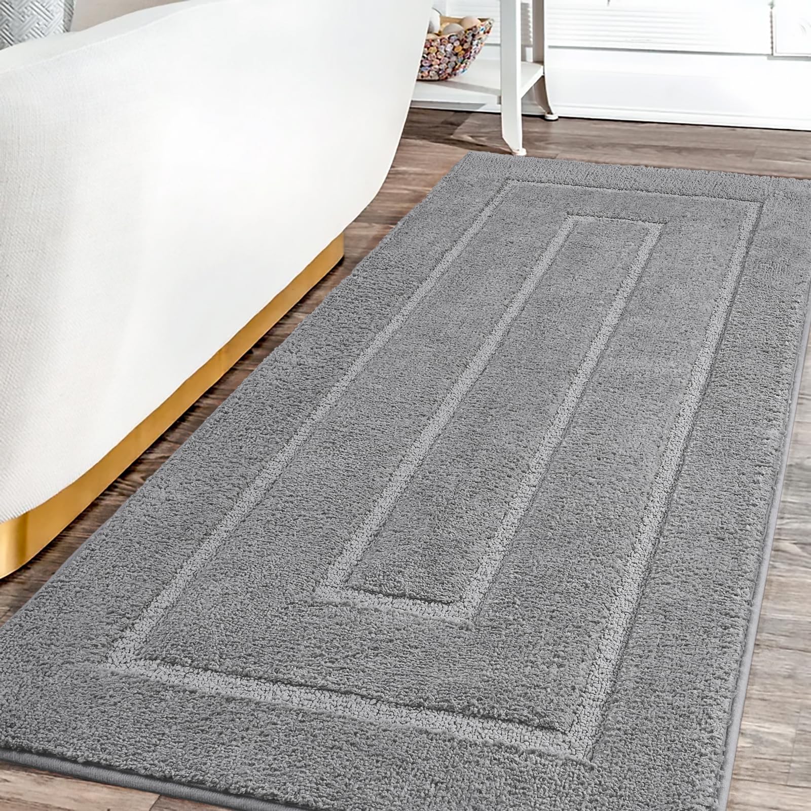HOMORE Grey bathroom rug 24x60 quick-drying finish keeps floors dry after showers.