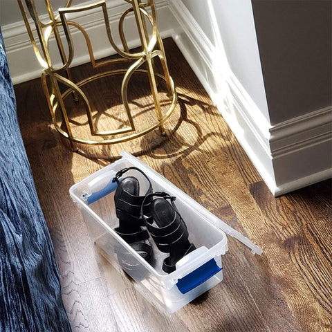 HOMZ bins holding art supplies and décor pieces.