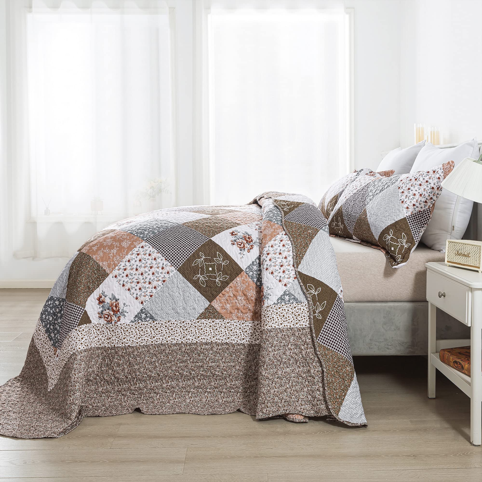 HoneiLife oversized king quilt draped on bed demonstrates generous coverage near floor.