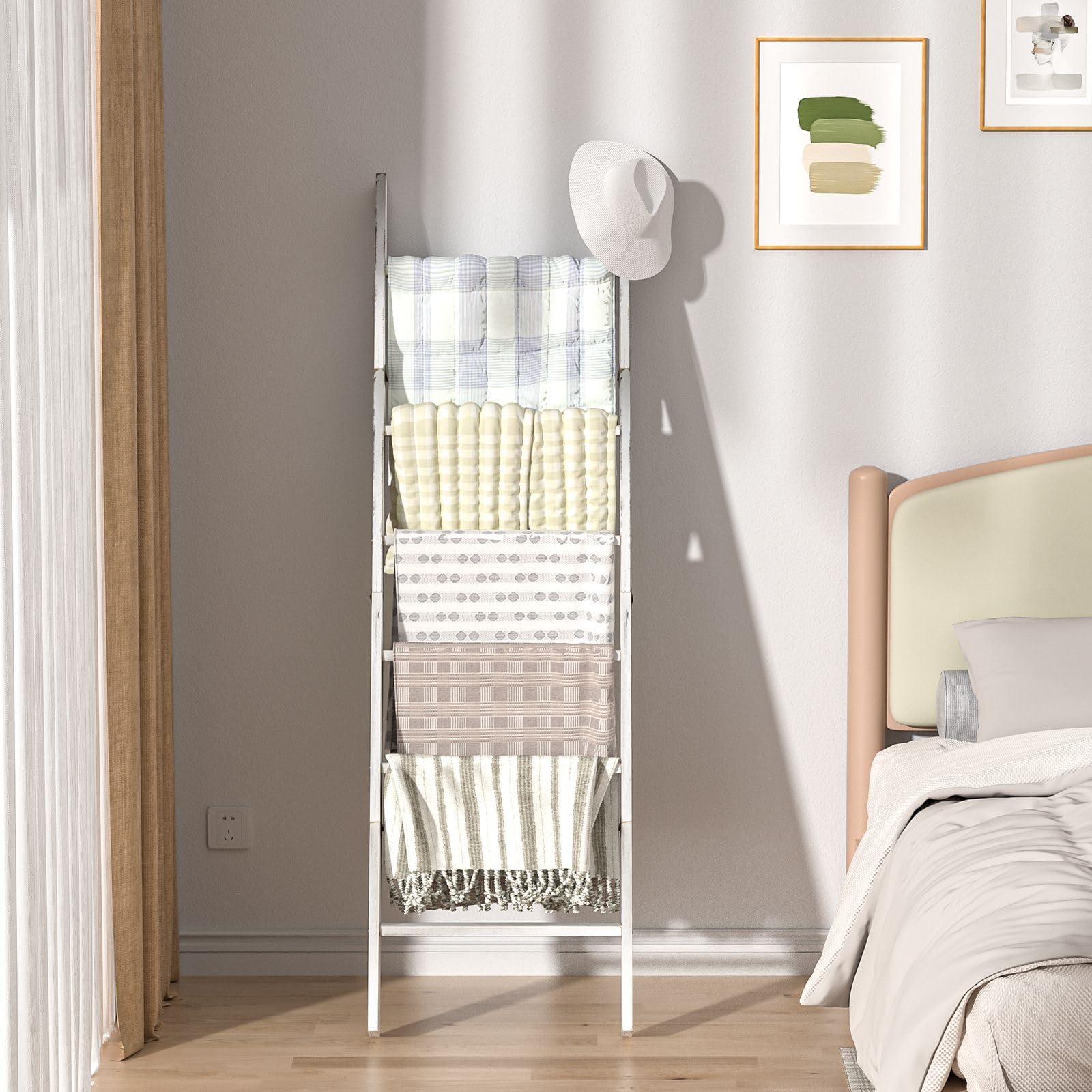 HONEST OUTFITTERS blanket ladder used as towel rack in a bathroom