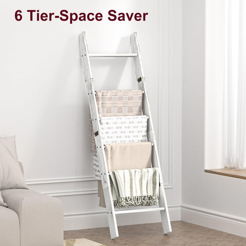 HONEST OUTFITTERS quilt-display ladder arranged in a bedroom for decorative storage