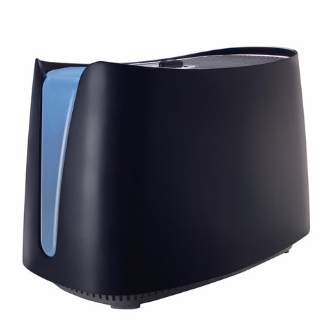 Honeywell cool moisture humidifier in a bedroom providing gentle humidity.
