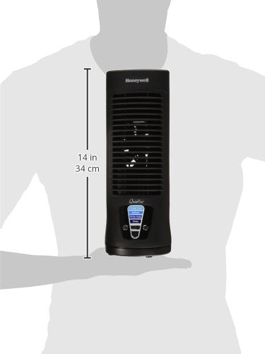 Compact Honeywell desk fan shown on a desk setup