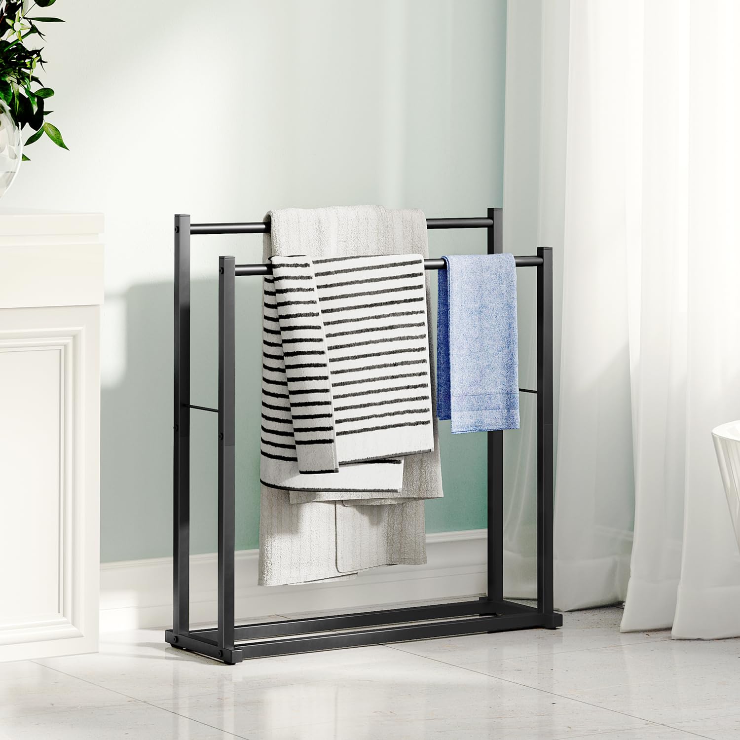 Honiter outdoor towel rack free-standing, ideal for poolside towel organization.