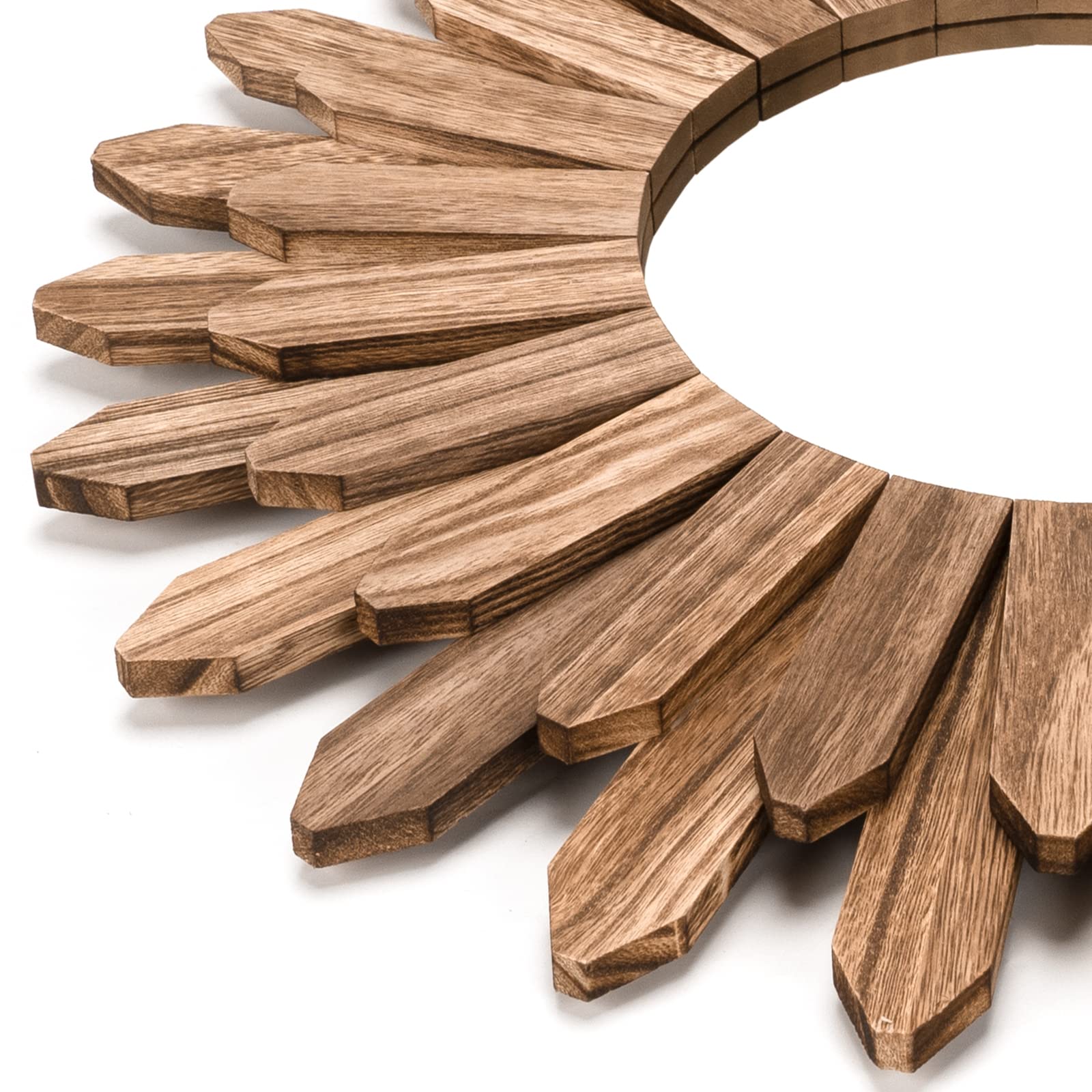 Honiway mirror boho sunburst base acts as a warm living room focal point.