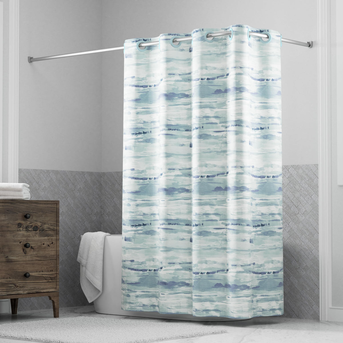 Hookless It's A Snap faux silk shower curtain with watercolor blue print for a fresh bathroom look.