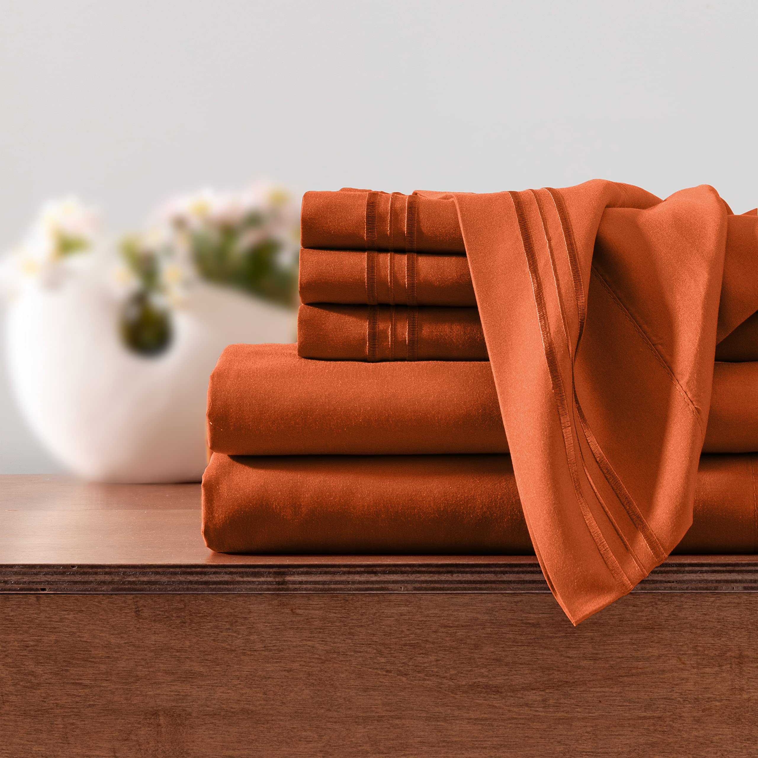 Horbaunal burnt orange queen care instructions show cold wash and low tumble dry