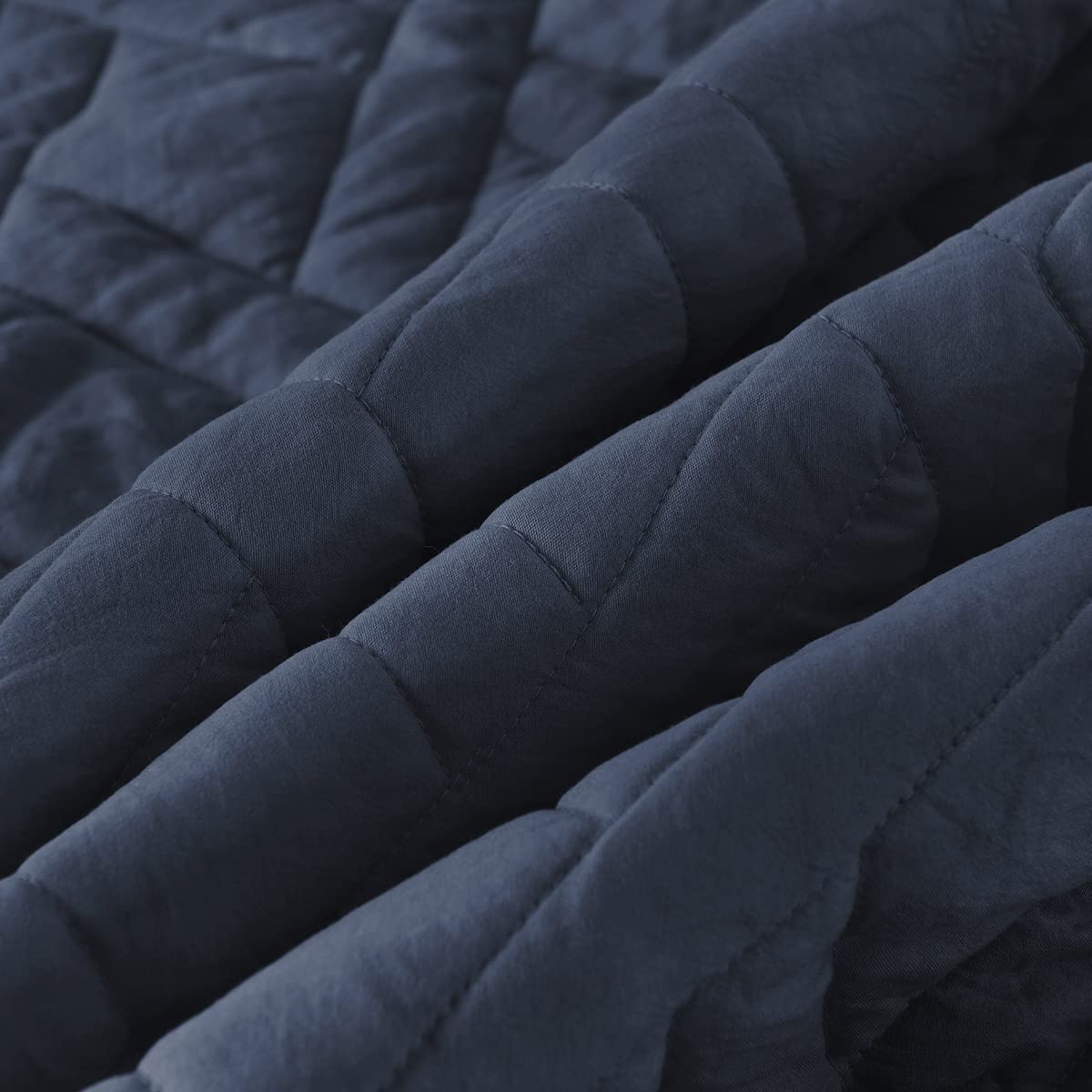 HORIMOTE HOME twin navy blue quilt features a diamond pattern for subtle texture.
