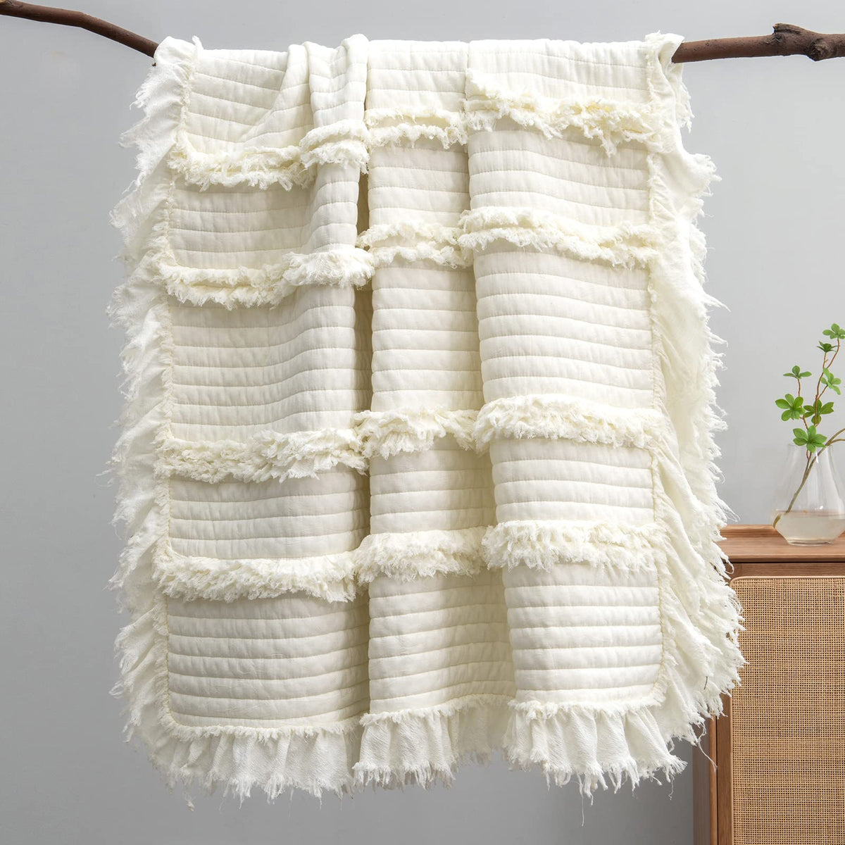 HORIMOTE HOME Ultra-Soft Throw Cream for cozy lounging on the sofa.