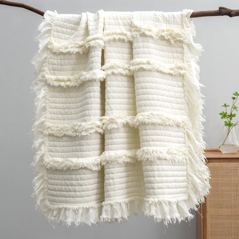HORIMOTE HOME Ultra-Soft Throw Cream for cozy lounging on the sofa.