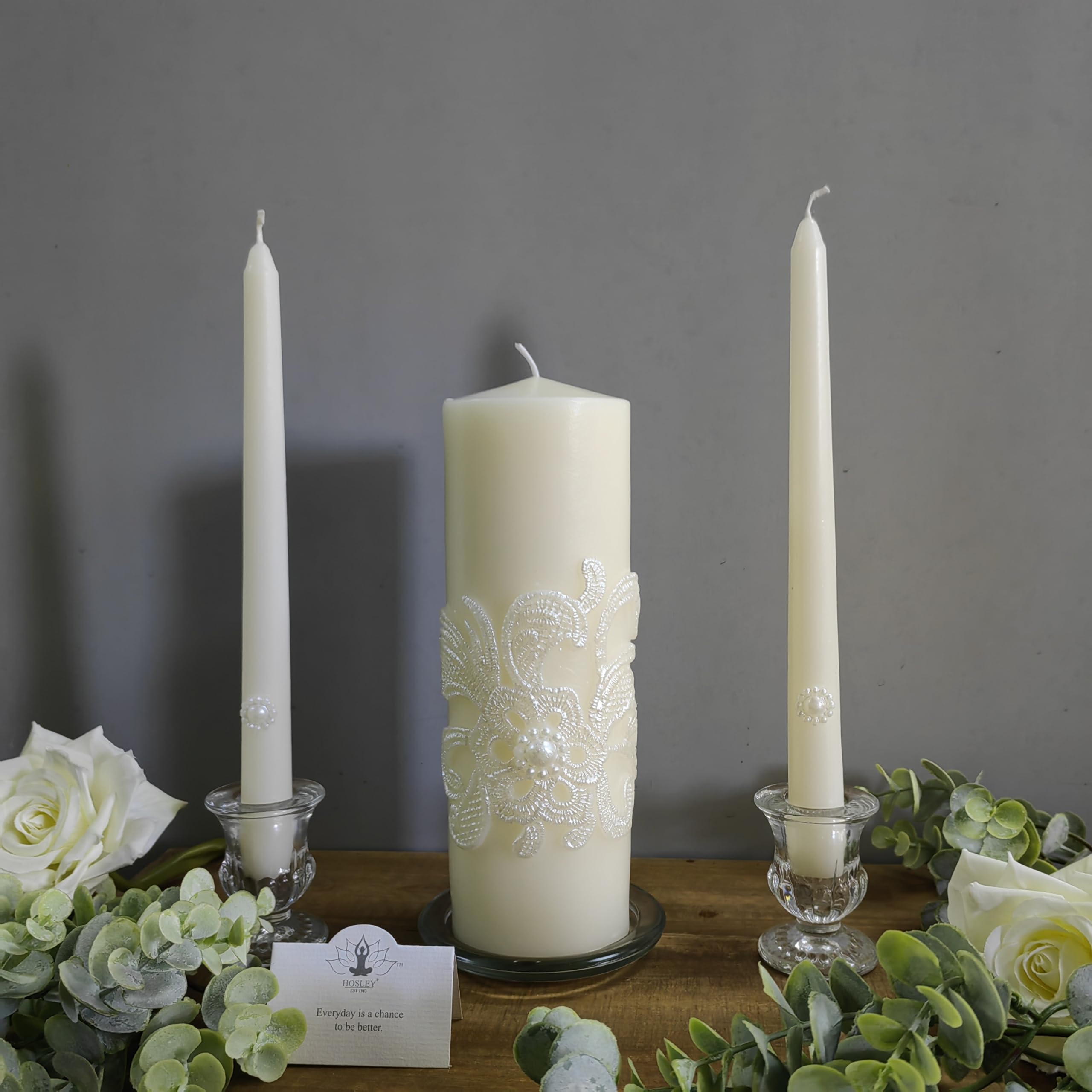 Hosley cream taper candles complement the pillar candle for framing moments.