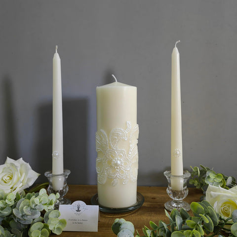 Hosley cream taper candles complement the pillar candle for framing moments.