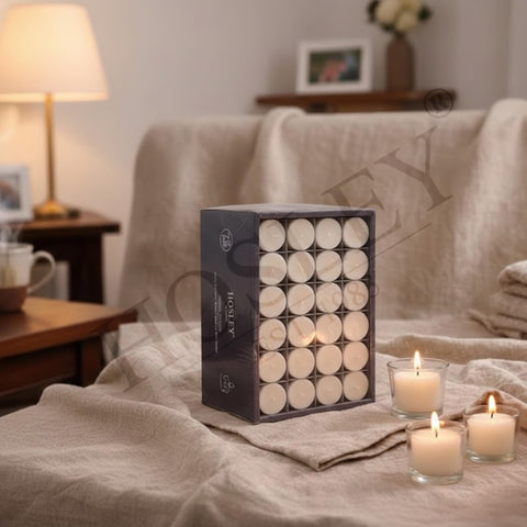 Hosley unscented white votive candles 72-pack in a wedding centerpiece