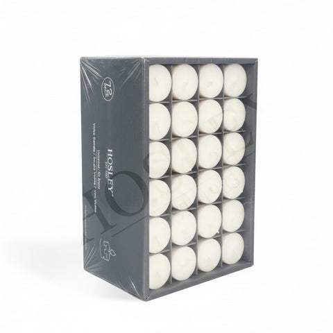 Hosley unscented white votive candles 72-pack displayed in a centerpiece