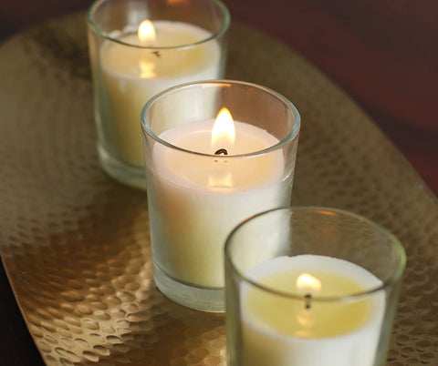 Hosley votive candles two point one inch diameter fit standard holders.