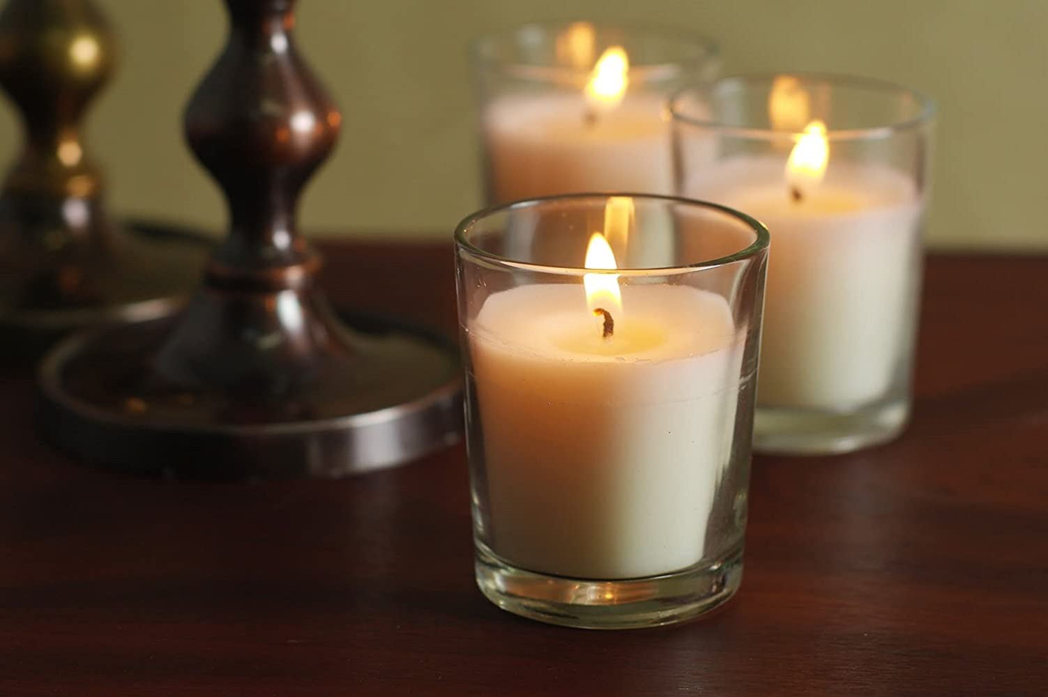 Hosley wedding centerpiece setup with elegant glass holders and warm white glow.