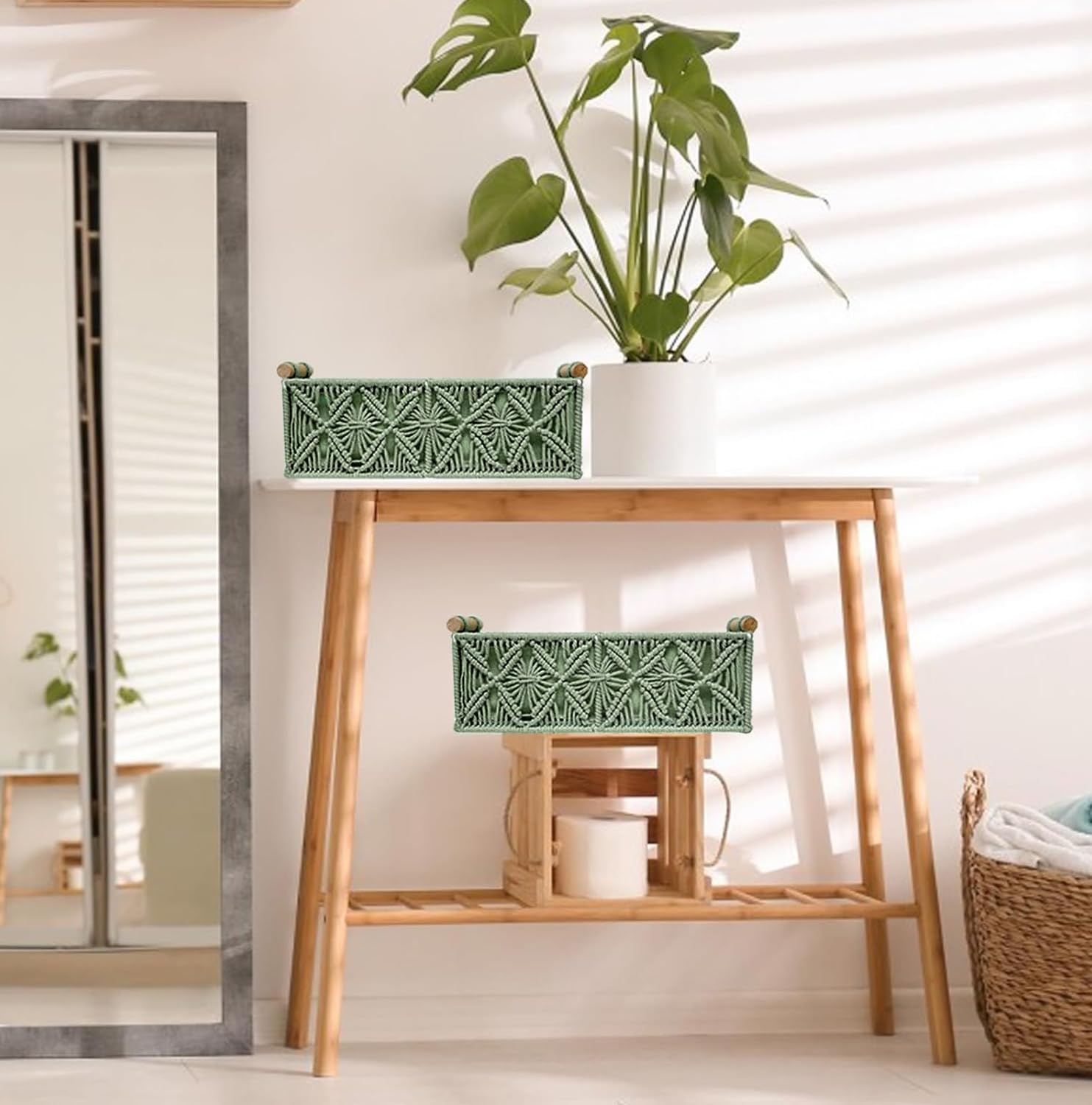HOSROOME macrame green basket keeps bathroom essentials neatly arranged.