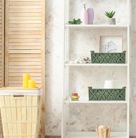 HOSROOME macrame green basket used as toilet paper holder with wood frame.
