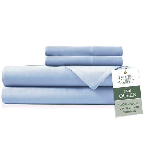 Hotel Sheets Direct 4-piece queen set on bed for hotel-like luxury at home.