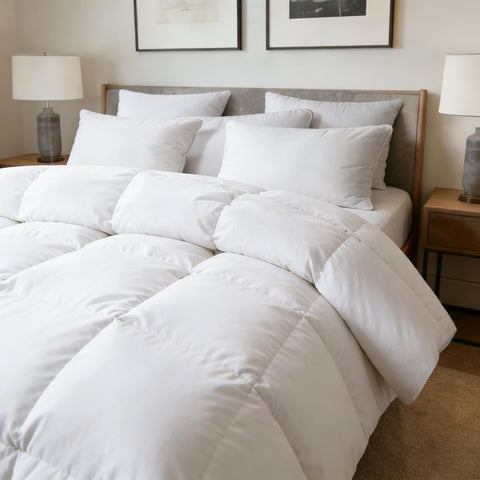 Hotel Suite feather down comforter adapts to seasons for cozy warmth and breathability.