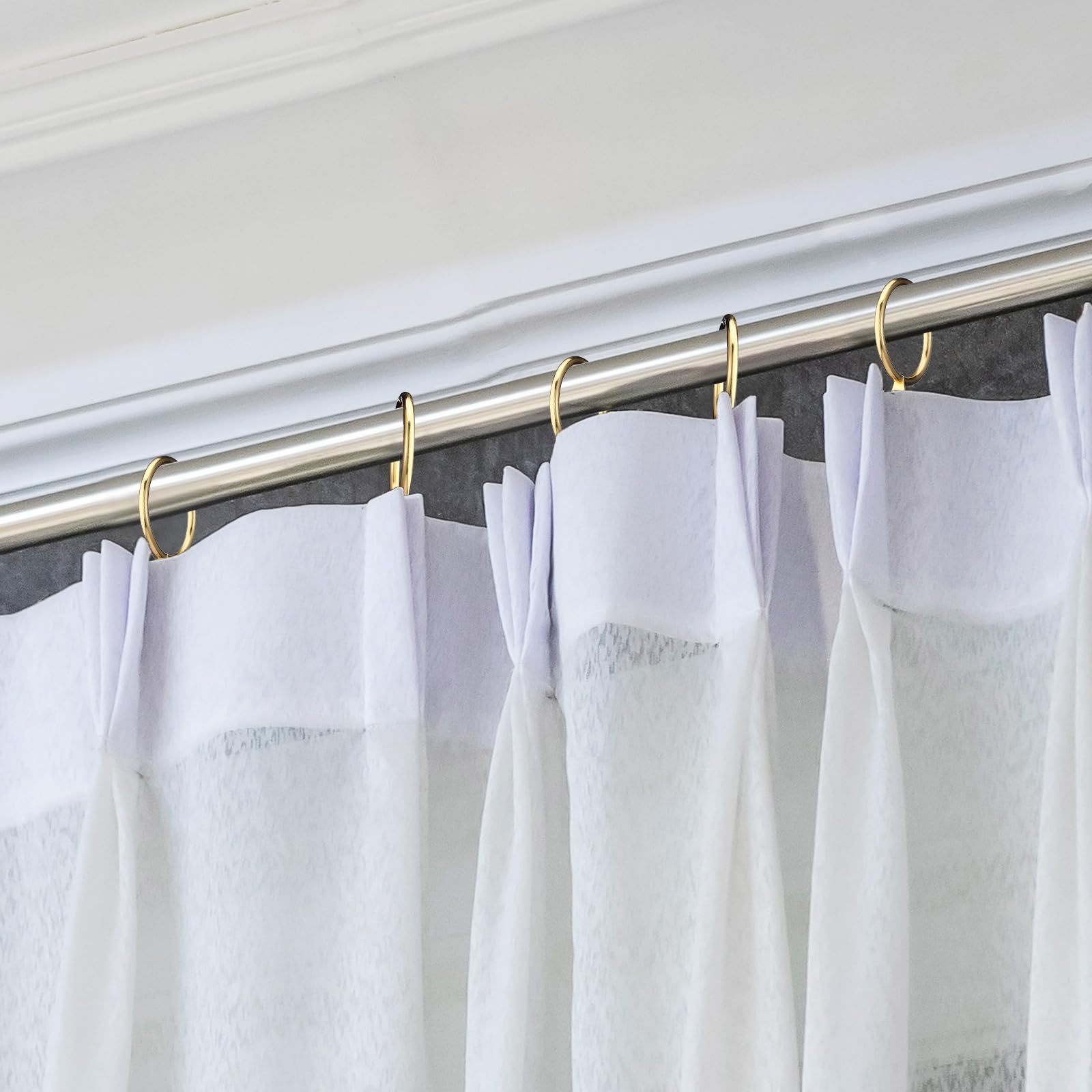 Hotop metal curtain pin hook close-up showing sharp tip handling.