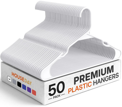 HOUSE DAY plastic hangers in white keep clothes organized and accessible.