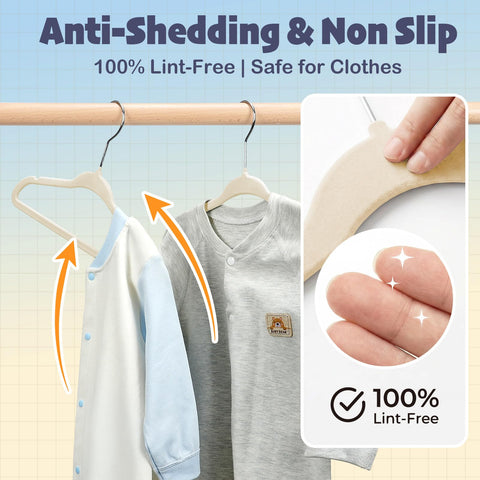 HOUSE DAY velvet baby hanger in closet with slim space-saving profile.