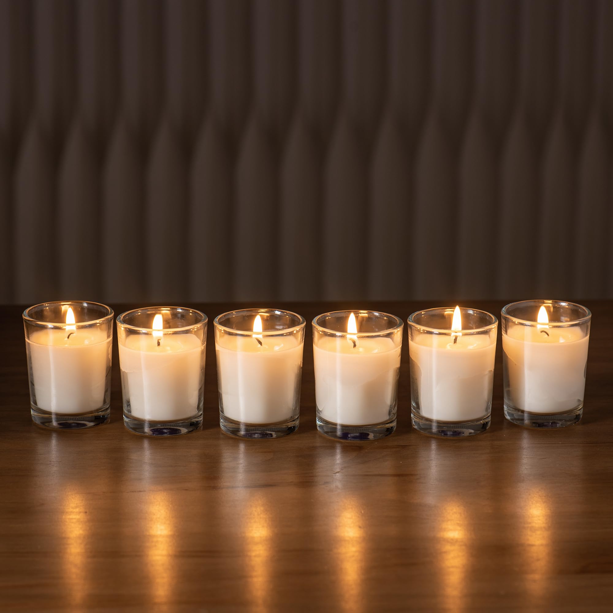 Housecret unscented glass votives suit weddings and spa settings.