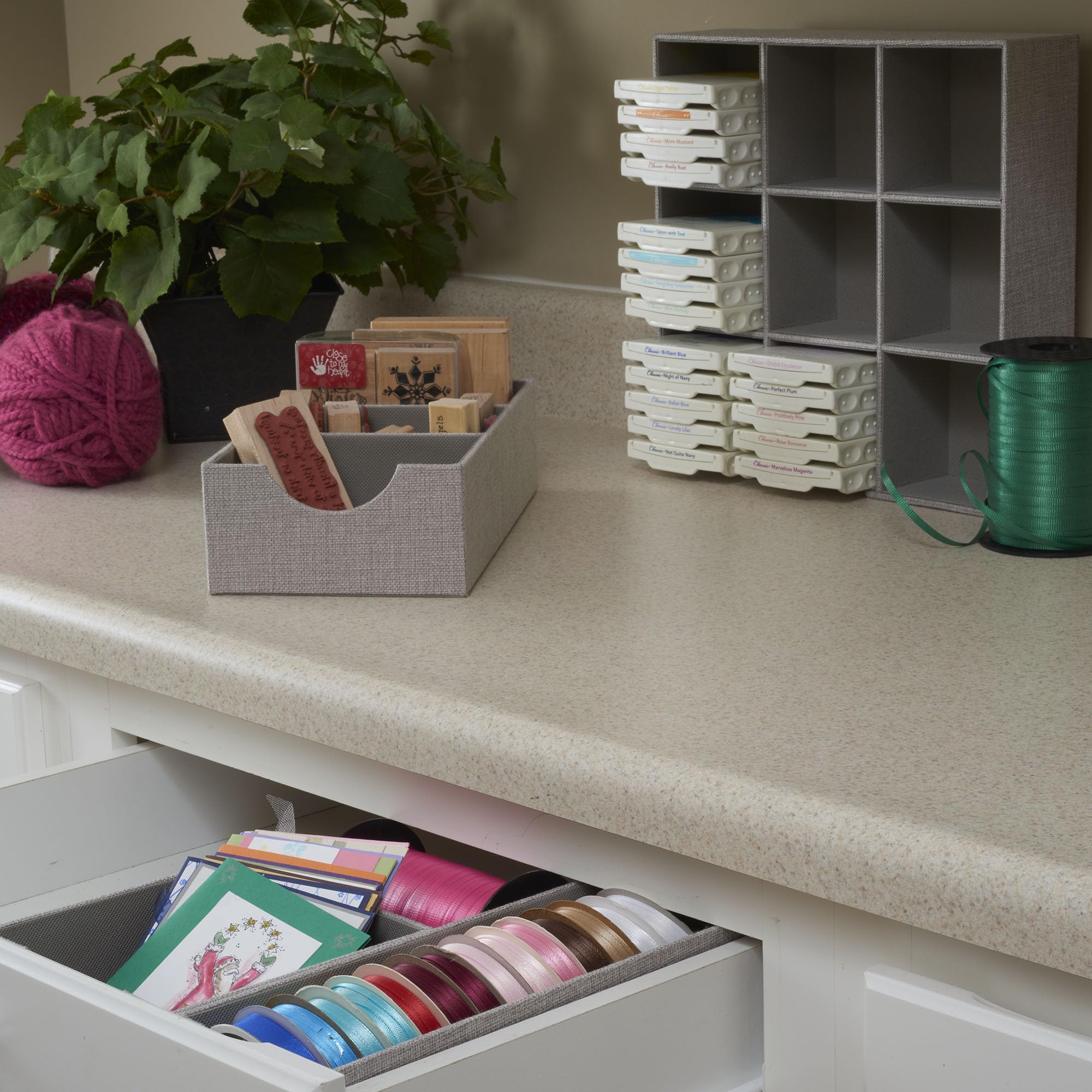 Household Essentials organizer displayed on a dresser for neat surface storage.
