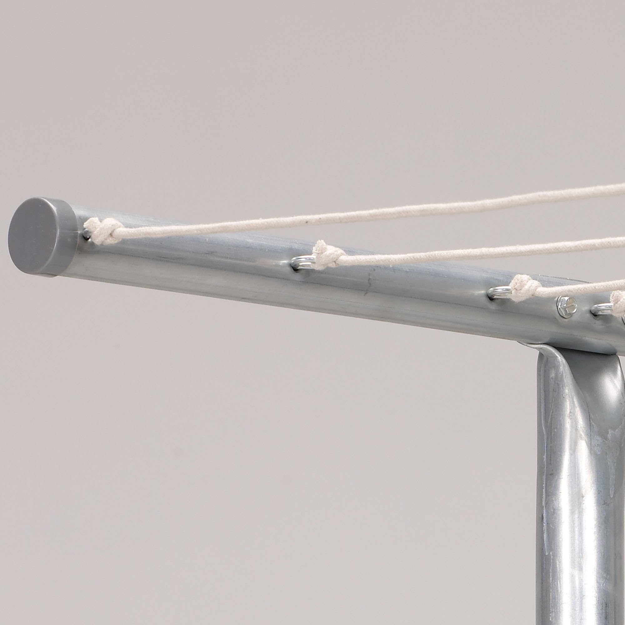 Household Essentials pre-drilled eyelets enable quick, tool-friendly setup.