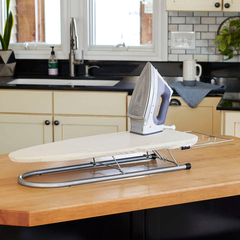 Household Essentials compact board, collapsed, ideal for door storage in dorms.