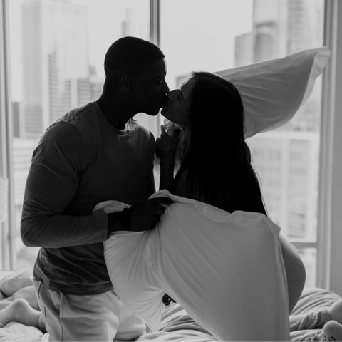Houseify Tuck Me In Pillow in a cozy bedding scene for restful nights.