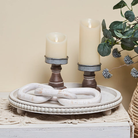 HPC Decor round tray shown with three ball feet protecting surfaces