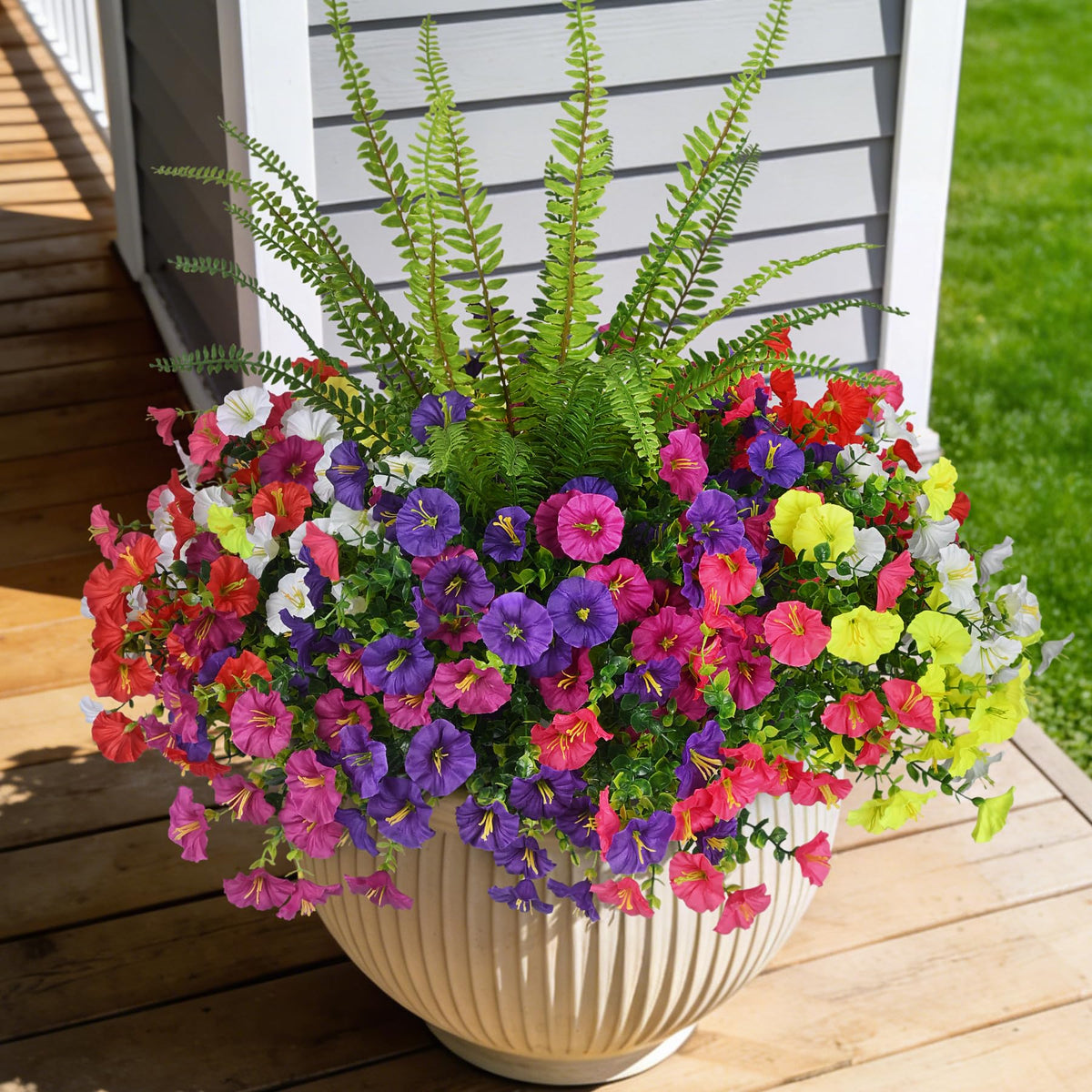 Hrobek artificial fern bundle for outdoor use adds lush greenery to porches.