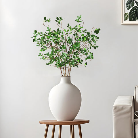 Htmeing eucalyptus branches centerpieces offer year-round greenery and texture.