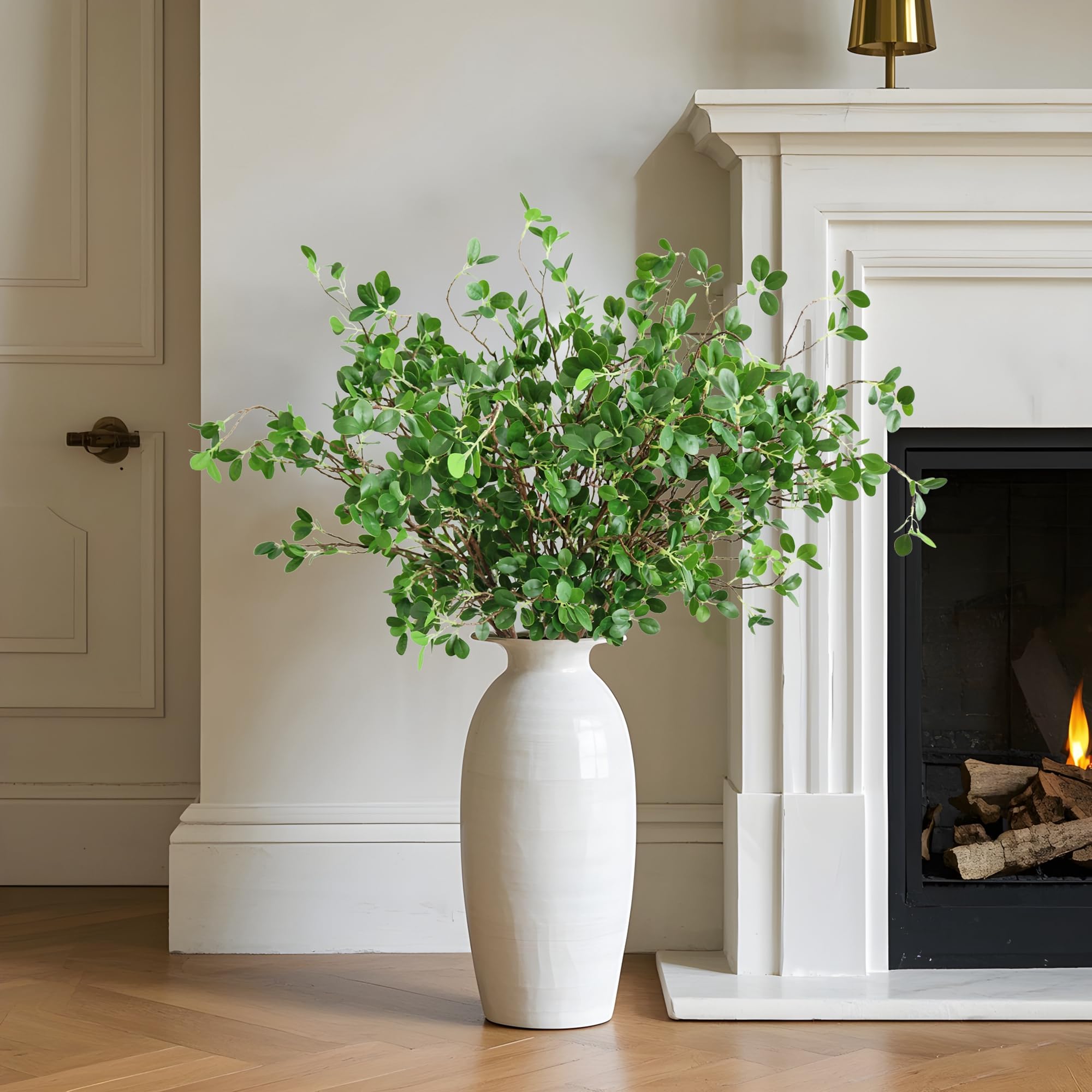 Htmeing farmhouse-style eucalyptus branches add rustic charm to interiors.