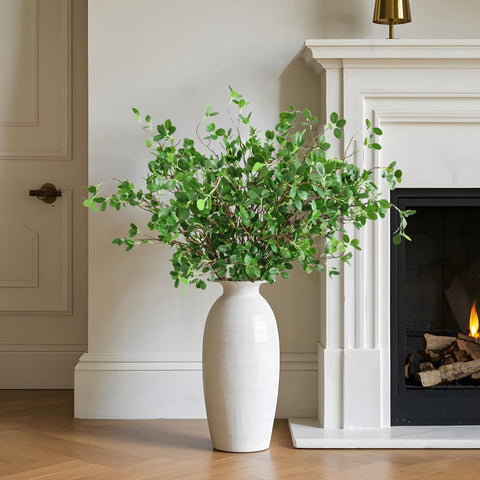 Htmeing farmhouse-style eucalyptus branches add rustic charm to interiors.