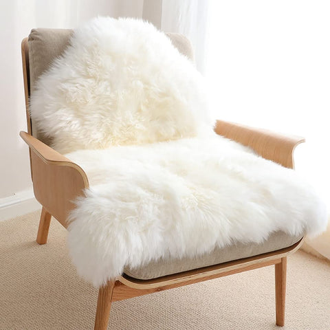 HUAHOO premium sheepskin rug doubles as chair cover adding warmth and style.