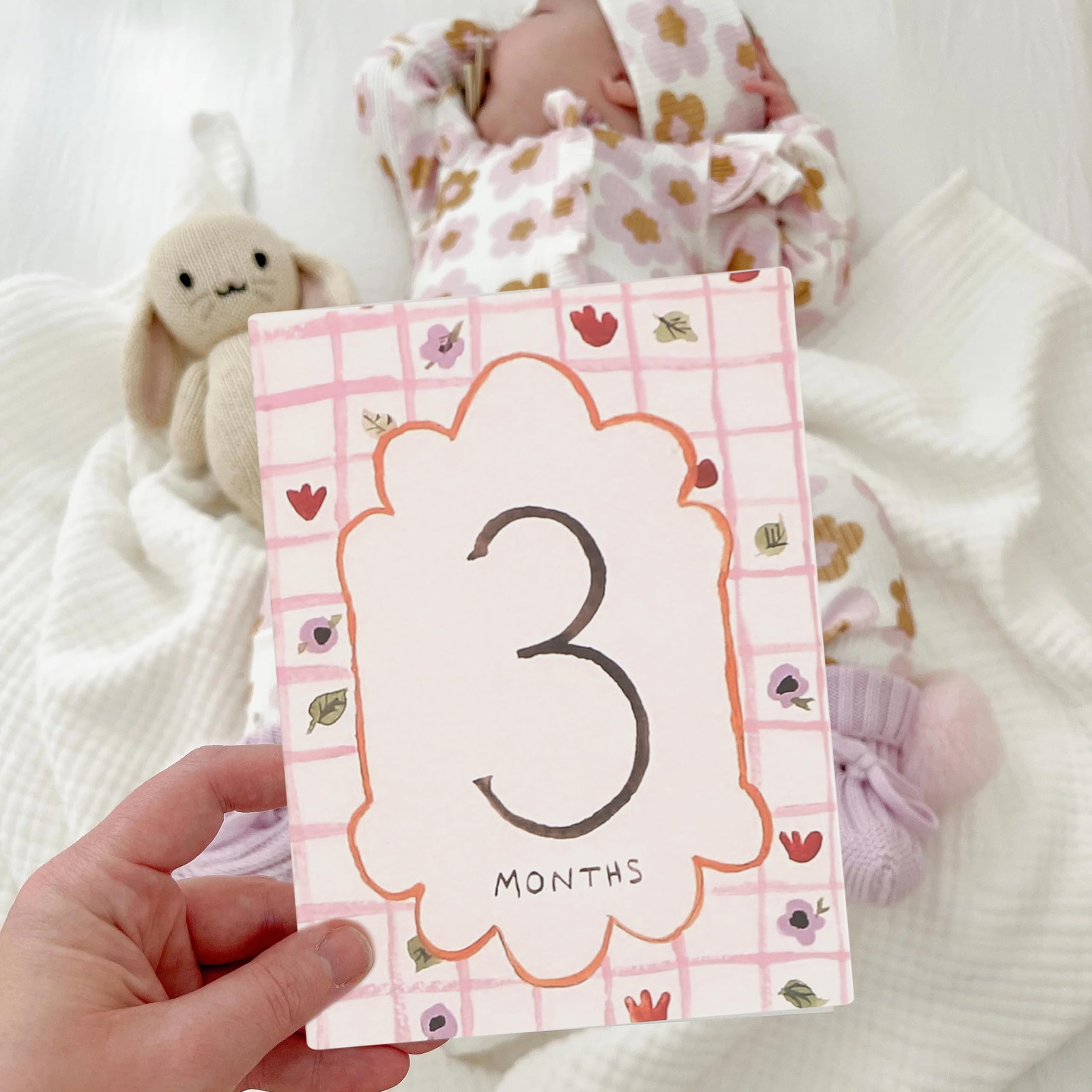 HUHJRUAR monthly milestone cards celebrate each month with cute layouts for photos.