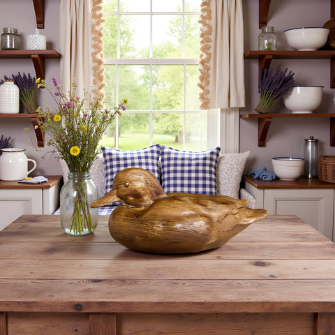 Huitony duck statue elevates office and bookshelf decor.