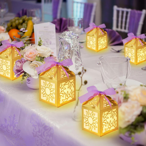 Humyoun gold sun lantern on table decor, perfect for warm party ambiance.