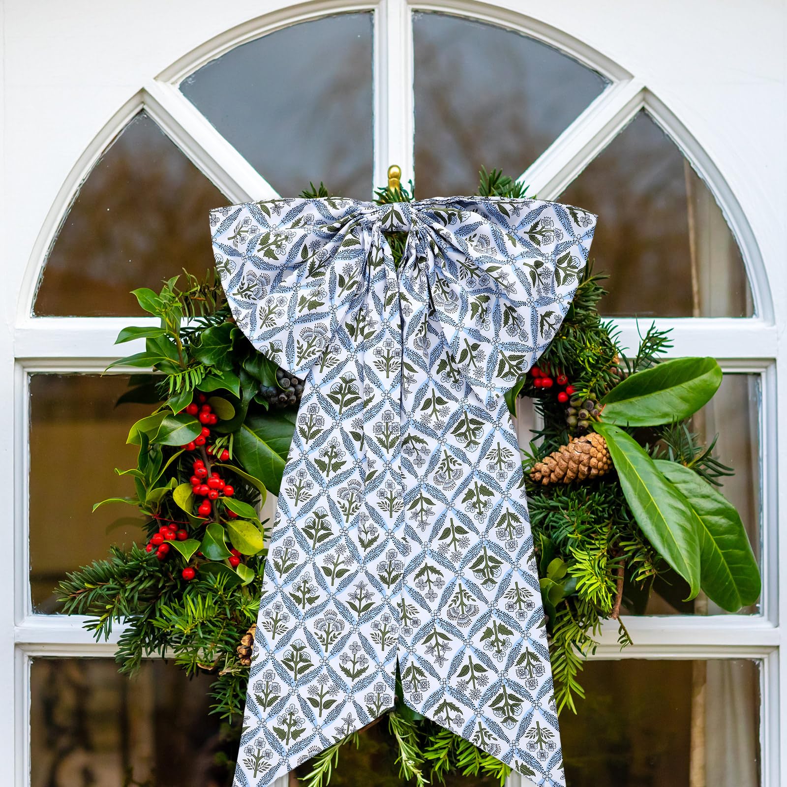 HunnmingRe front-door decor featuring blue block print wreath sash