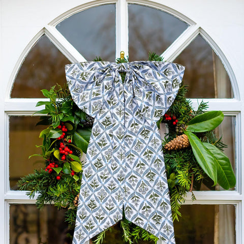 HunnmingRe front-door decor featuring blue block print wreath sash