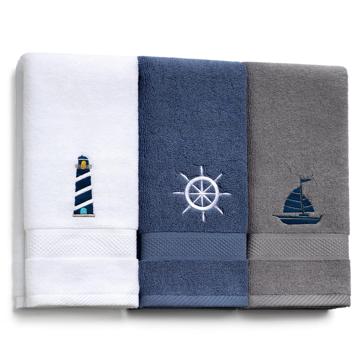 HunnmingRe nautical hand towel with lighthouse embroidery adds coastal charm to the bathroom.