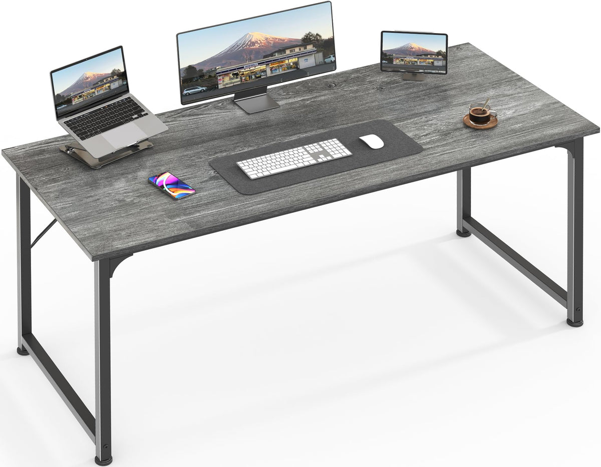 Huuger 55-inch computer desk with a spacious surface for multiple devices and coffee.