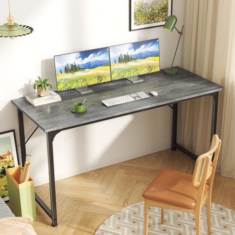 Huuger desk shows a sturdy metal frame and solid legs for stability.