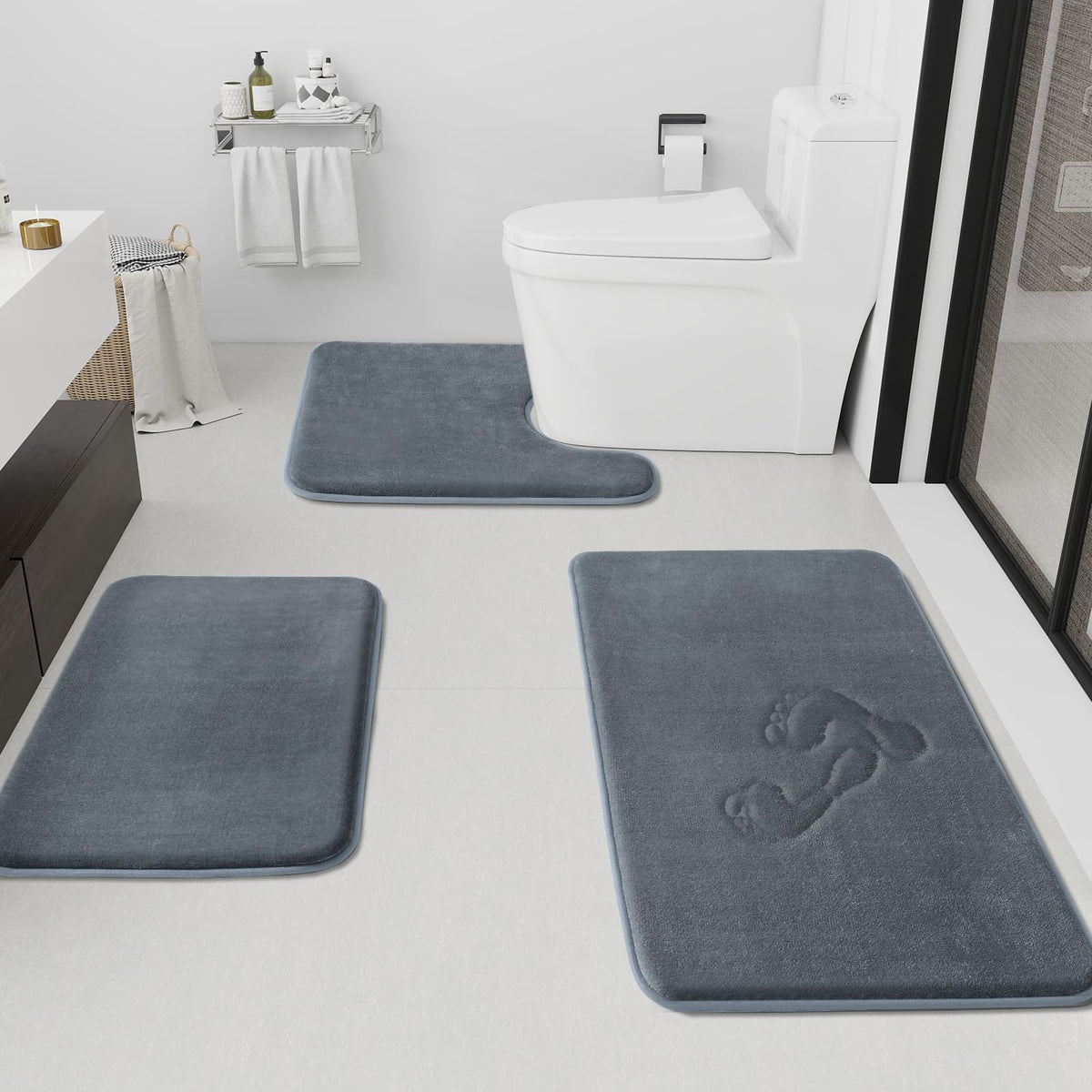 HUXMEYSON 3-piece bathroom rugs set displayed together for coordinated bathroom comfort.