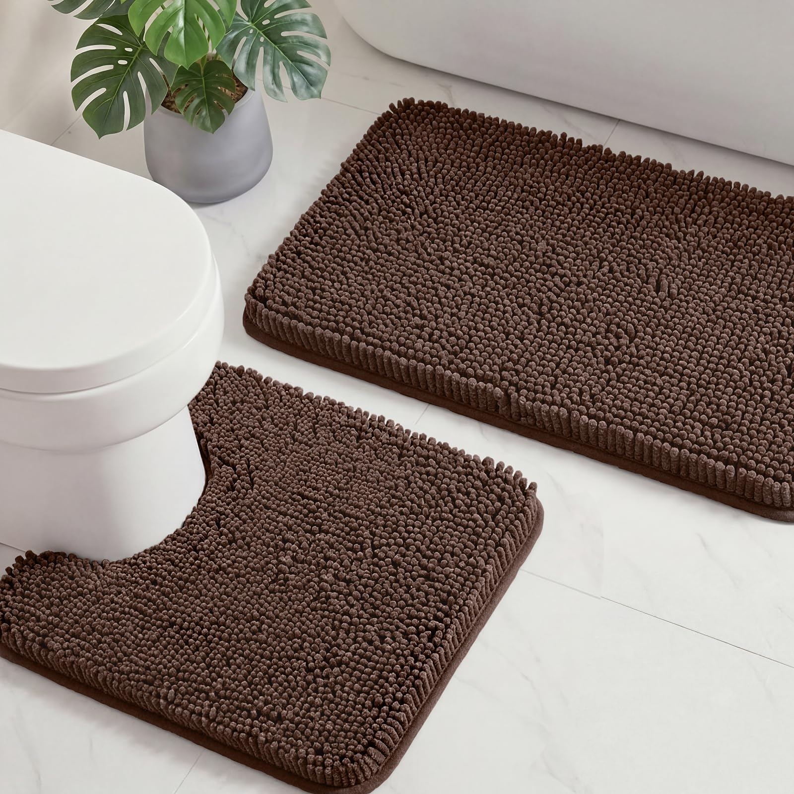 HUXMEYSON navy rectangular bath mat 20x32 offers plush comfort and quick moisture uptake.