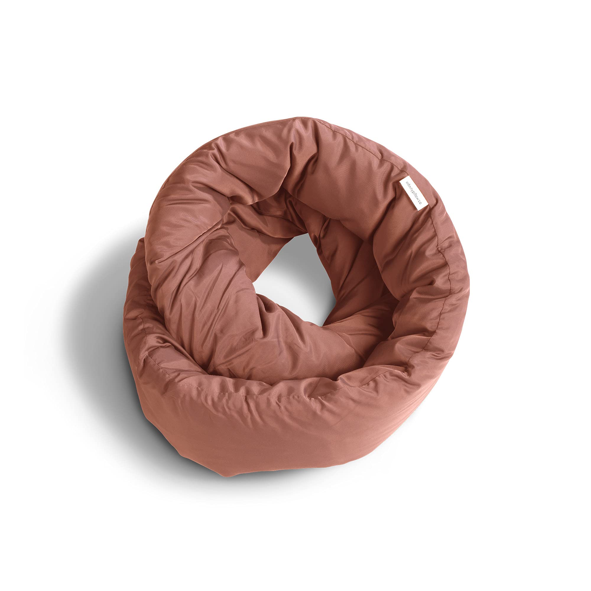 Huzi Infinity Pillow with 360° support adapts to your resting position.