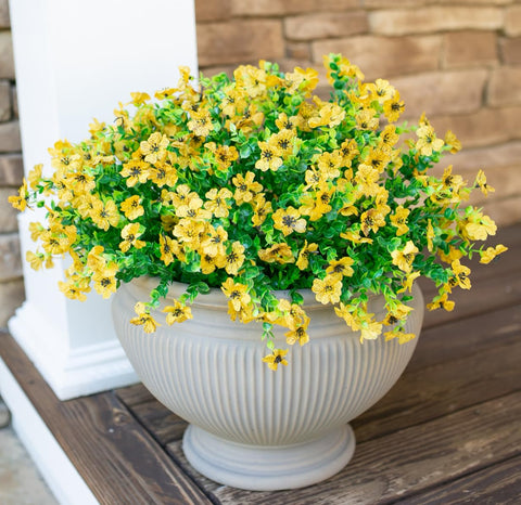 HyeFlora porch décor with yellow daisies boosts curb appeal.